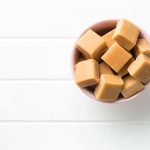 Sweet caramel candies in bowl made without sweetened condensed milk