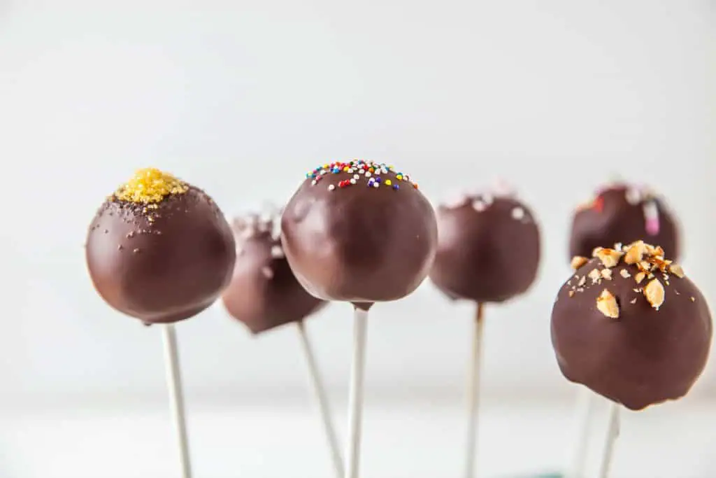 chocolate cake pops with various toppings
