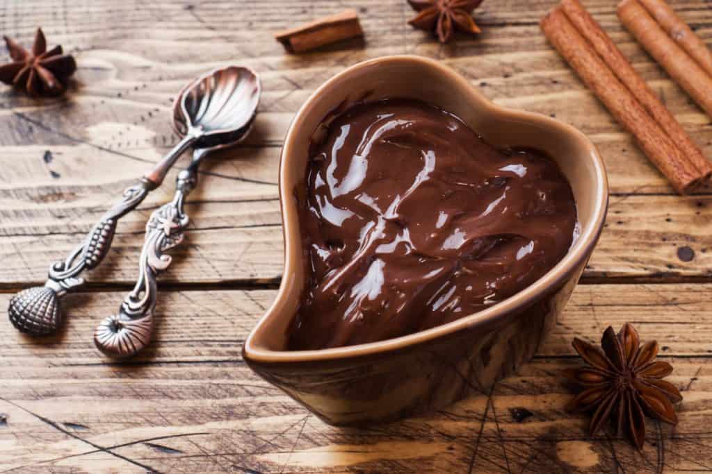 chocolate fondue in a heart shape bowl
