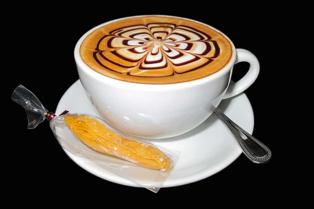 caramel coffee in white mug